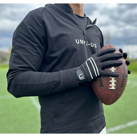 View of Football Player wearing the UNYT-US 1.0 Football Receiver Gloves making a catch
