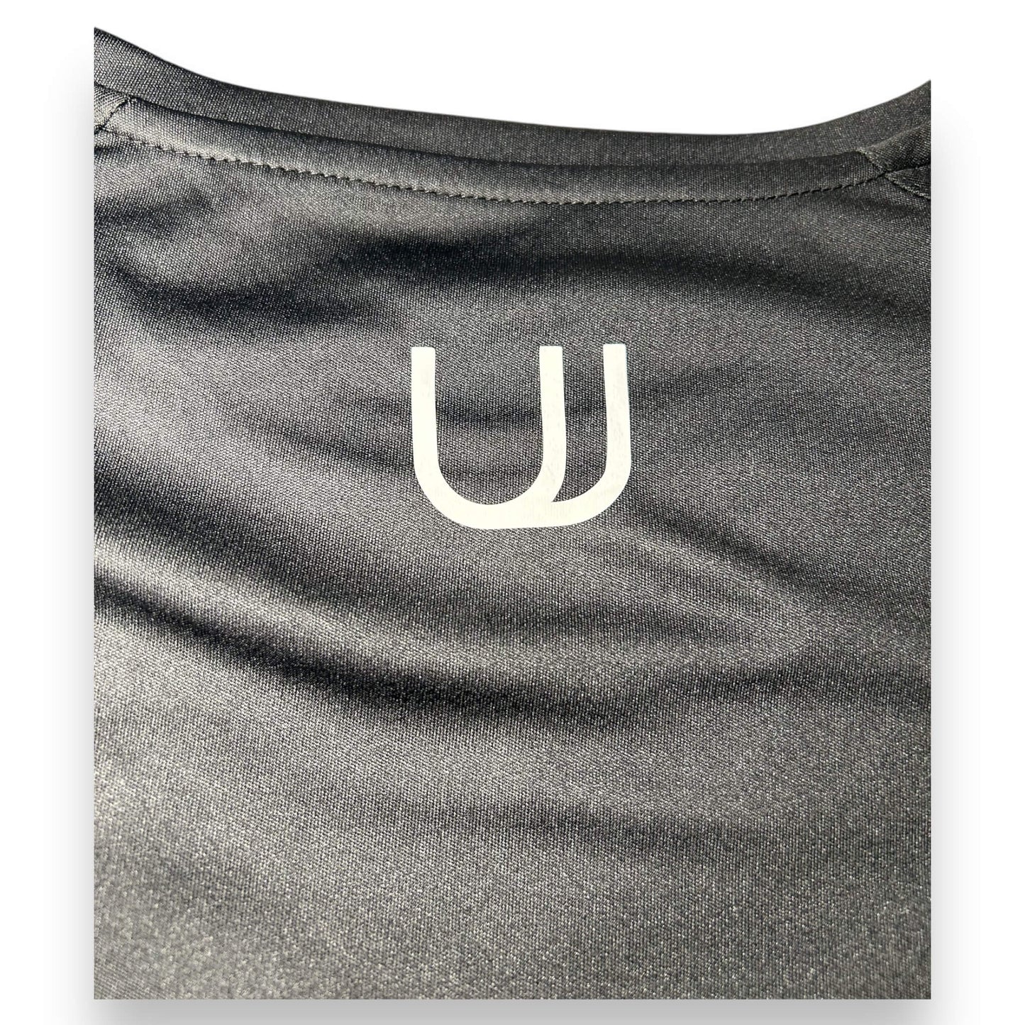 Logo on the back of UNYT-US Anytime Performance Short-Sleeve Shirt