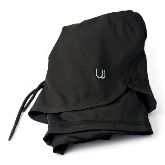 View of the black UNYT-US Moment Compression Lined Shorts for football & flag football with hidden pocket.
