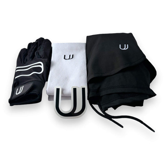 View of the bundle of UNYT-US products including the UNYT-US 1.0 Gloves, the UNYT-US Scrunching Socks and the UNYT-US Moment Compression Socks with complimentary sticker.