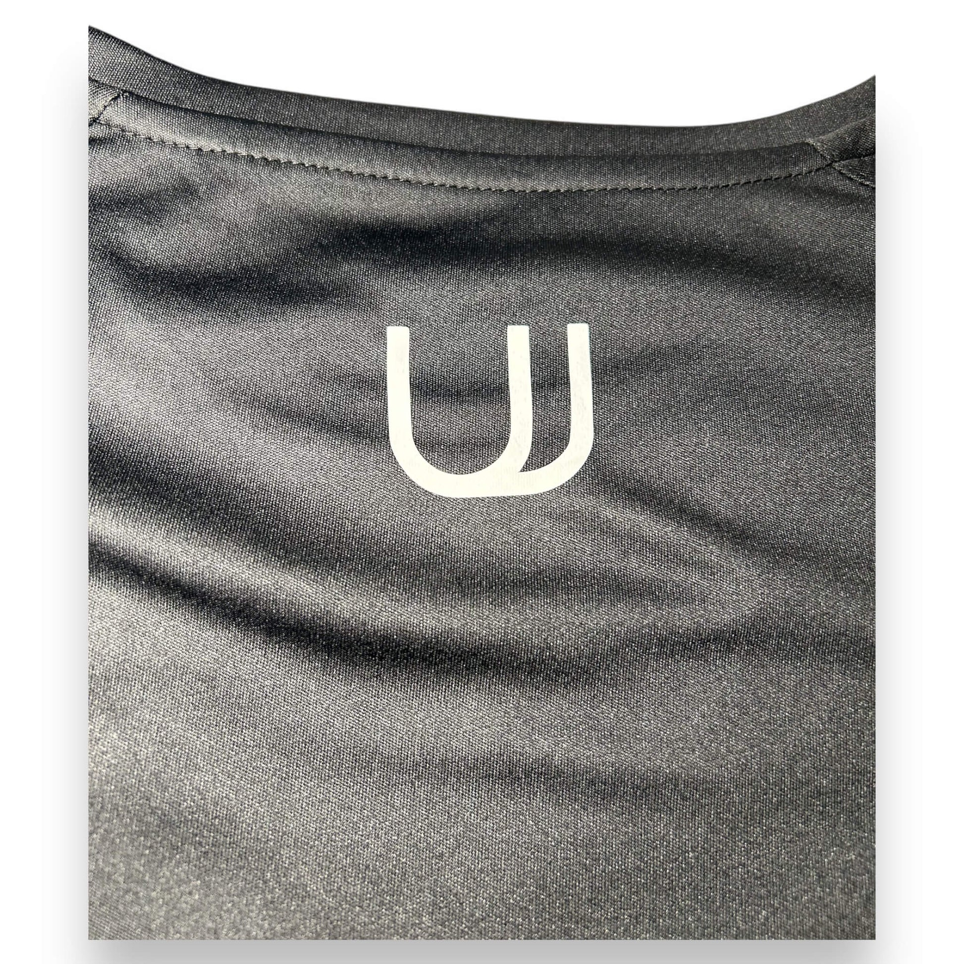 Logo on the back of UNYT-US Anytime Performance Short-Sleeve Shirt